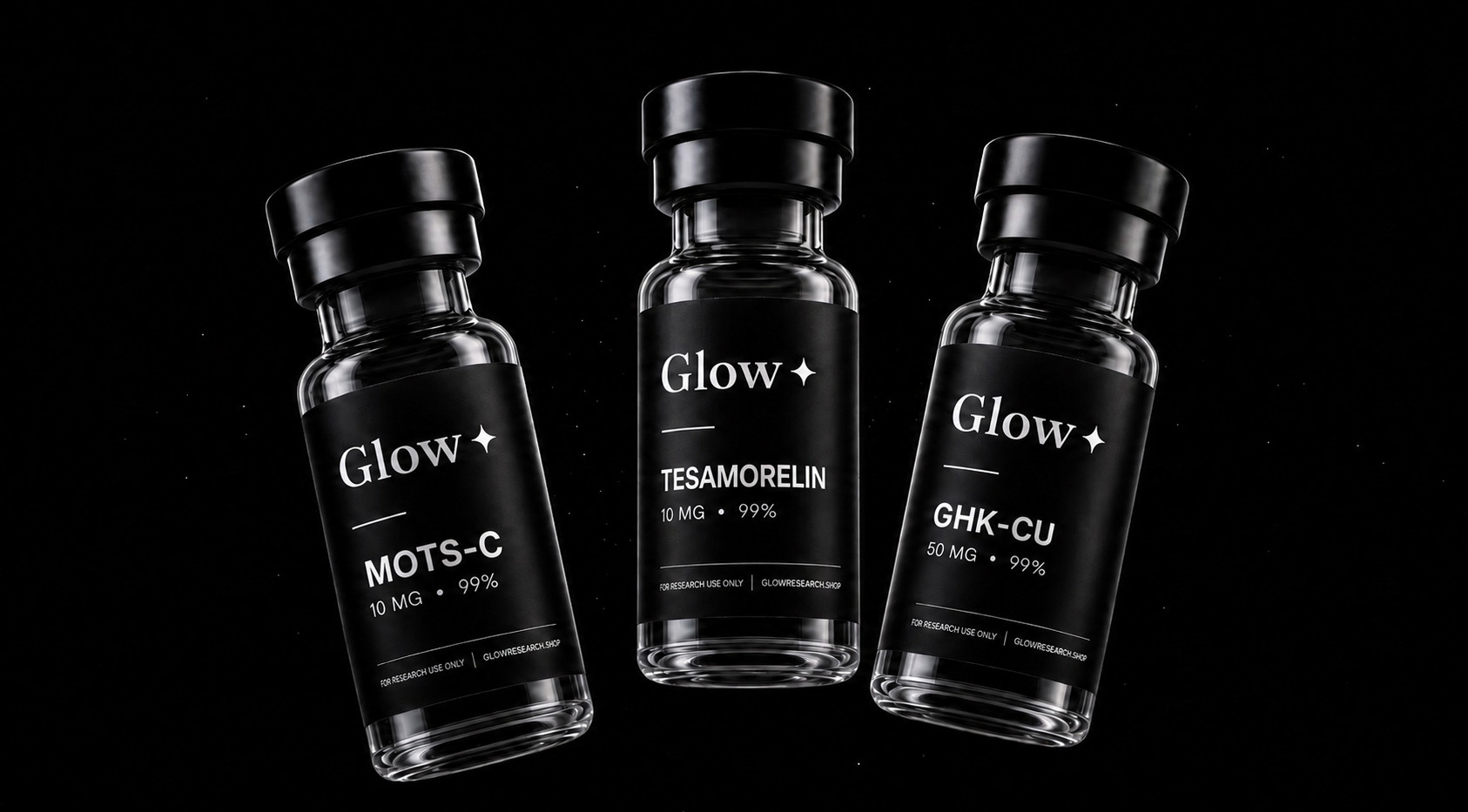 Three Glow Research peptide vials, MOTS-C, Tesamorelin and GHK-Cu, on a pure black backdrop